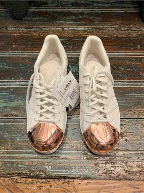 adidas Women’s White Sneakers with Rose Gold Shell Toe Caps